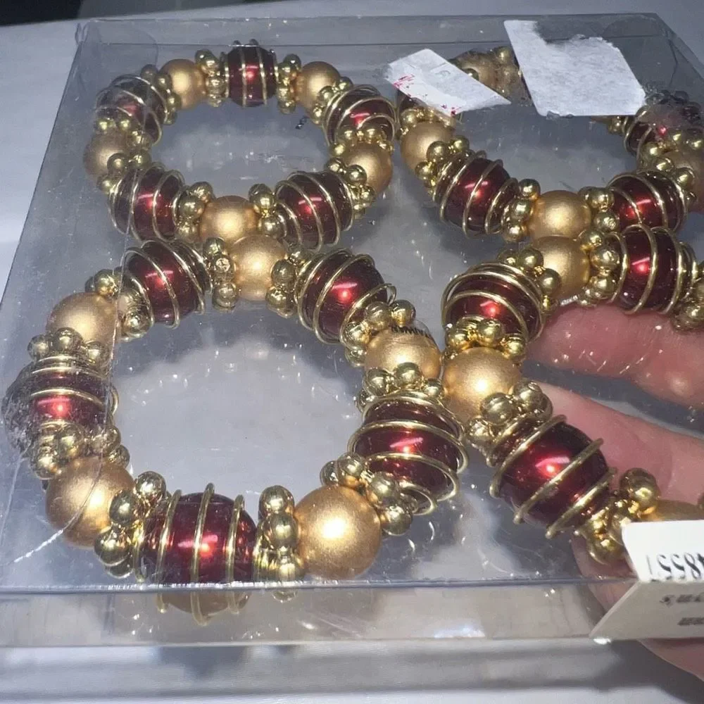 Set of Four Gold and Red Beaded Napkin Holders